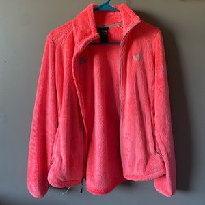 The North Face hot pink zip up jacket. Size small. In good condition.